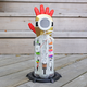 Included with the kit is Iron Man’s severed arm that can be used to display your kid’s creation.